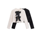 Amelia – Veste courte polyvalente ornée de nœuds et de paillettes