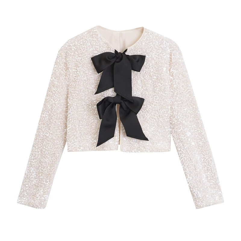 Amelia – Veste courte polyvalente ornée de nœuds et de paillettes